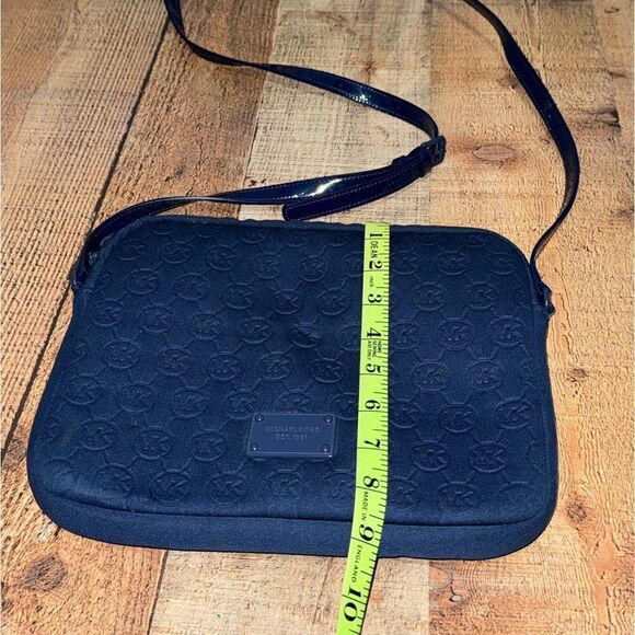 Michael Kors Mono Embossed Neoprene iPad Crossbody Purse Bag
Padded blue - Picture 11 of 16